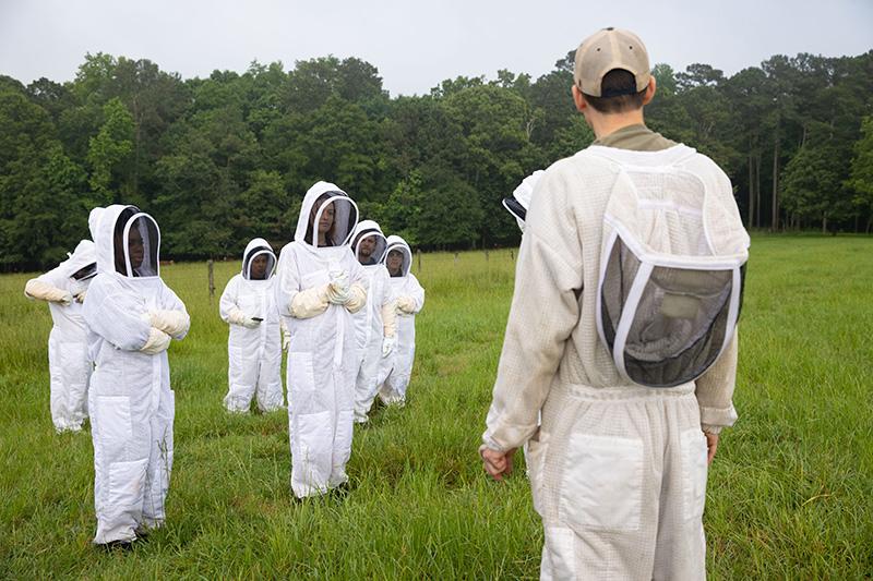 students suited up for beekeeping